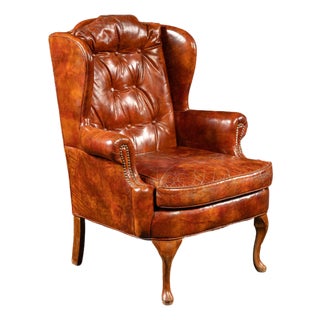 Mid 20th Century Tufted Leather Wingback Armchair in Burnt Amber For Sale