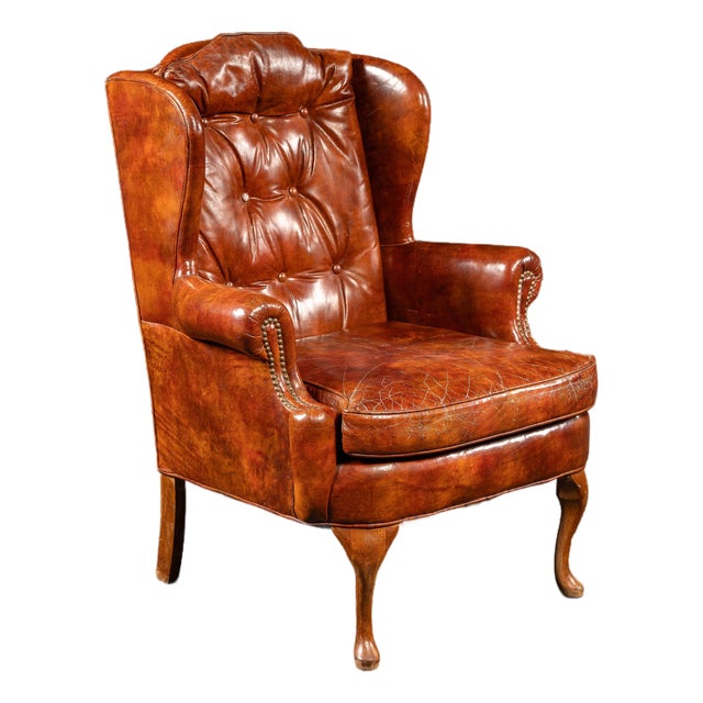Mid 20th Century Tufted Leather Wingback Armchair in Burnt Amber For Sale