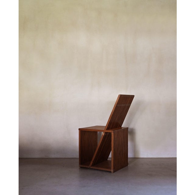 Strips wood occasional chair.A sculptural Brutalist occasional chair crafted entirely from wood, featuring finely spaced...