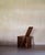 Strips wood occasional chair.A sculptural Brutalist occasional chair crafted entirely from wood, featuring finely spaced...
