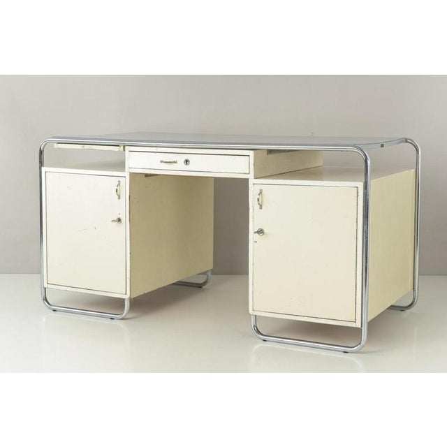 Article number: 1758 article name: large tubular steel desk designer: unknown year: arond 1950 manufacturer: unknown...