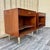A Pair of Refinished Mid Century Modern Nightstands by John Stuart. Circa 1960s Feature a sleek Mid Century Modern Design...