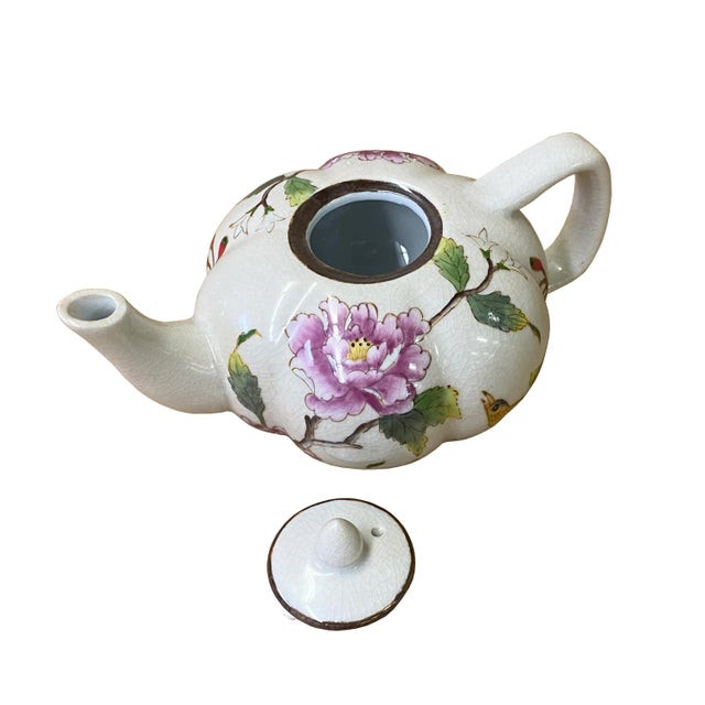 Quality handmade teapot shape display with flower and bird graphic. Not for beverage serving. Dimension: 8" x 5.5" x h4.5"...