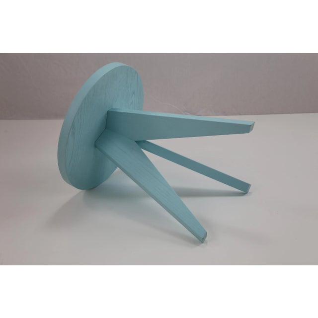 This Lollipop side table is handmade using European oak. The surface is painted in light blue. Alternative colors are...