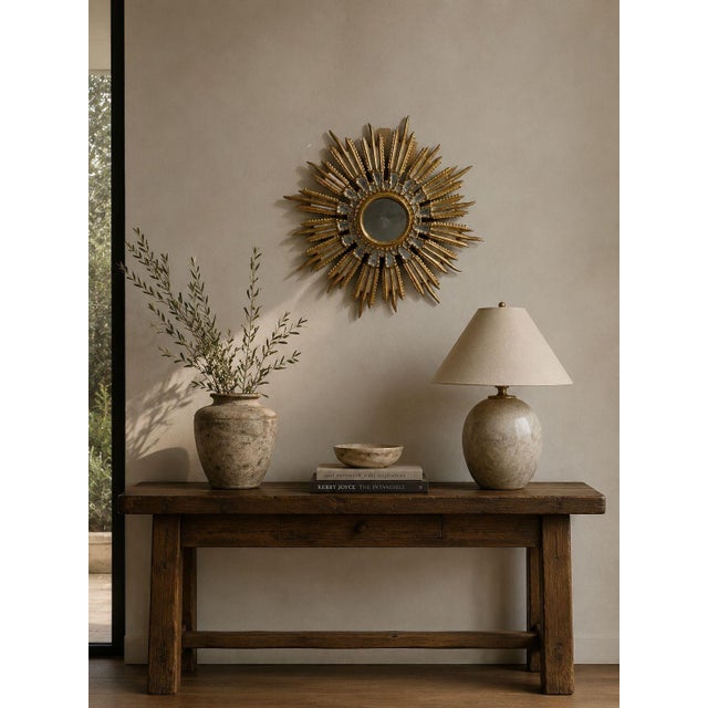 Line Vautrin Style, French Mid-Century Modern, Sunburst Wall Mirror, Clayed Gilt, Mirror, France, 1960s A small sunburt...