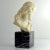 Bust of Christ, handcrafted from natural alabaster. Set on a polished black marble base. Dating from the turn of the 20th...