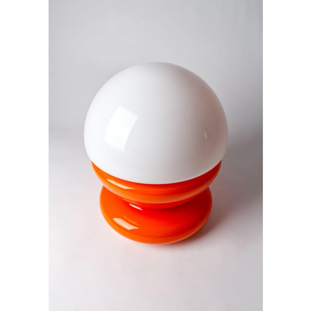 Vintage Space Age Spanish Table Lamp in Orange and White Glass, 1970s, in Good conditions. Designed 1970 to 1979 European...