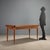 1960s table characterized by a classic line, enhanced by extendable leaves that make it particularly versatile. The...