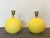 Pair of 70s table lamps in yellow ceramic, small difference in height in the brass that support the light bulb door, see...