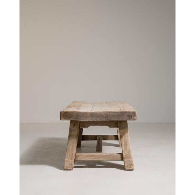 A refined example of French modernist craftsmanship from circa 1970, this oak coffee table reflects the clean geometric...