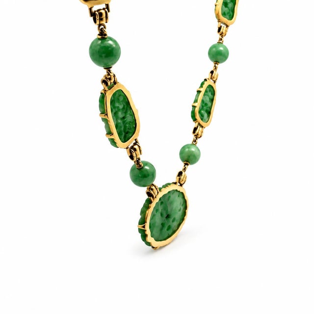 Antique statement necklace featuring genuine natural hand-carved jade beads strung with solid 14K yellow gold accents and...