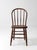 This antique late 19th-century American Windsor bow back chair features a continuous bentwood crest rail, five spindles, a...