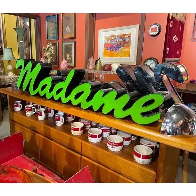 You can place this side by side with my "Monsieur" sign also on my storefront. A fun confection from the 1970s.