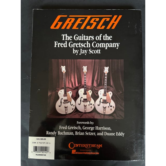 Filled with black and white as well as color plate illustrations, this vintage book on Gretsch guitars is visually...