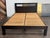 Design Plus Gallery presents the Queen Size West Elm Low Cut Out Bedframe. Constructed from wood in an espresso-brown...
