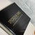 A stack of four large hardcover coffee table books from the Spectacular Homes series published by Panache Partners,...