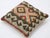 A one-of-a-kind handwoven Afghan wool kilim accent pillow featuring hooked concentric diamond. Cut and sewn by hand from a...