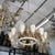 Meticulously restored large "Ballerina" chandelier by acclaimed Finnish designer Paavo Tynell for Lightolier. Featuring...