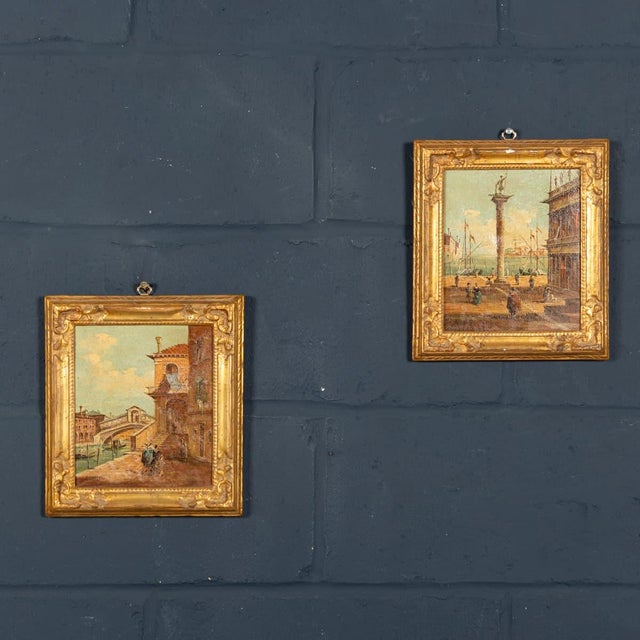 A charming pair of italian oil paintings by aldo grossi, dating to the early 20th century, depicting two iconic venetian...