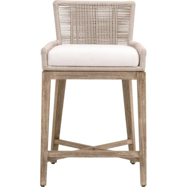 The Overlay Counter Stool by Essentials For Living is a perfect blend of style and strength, making it a standout in any...