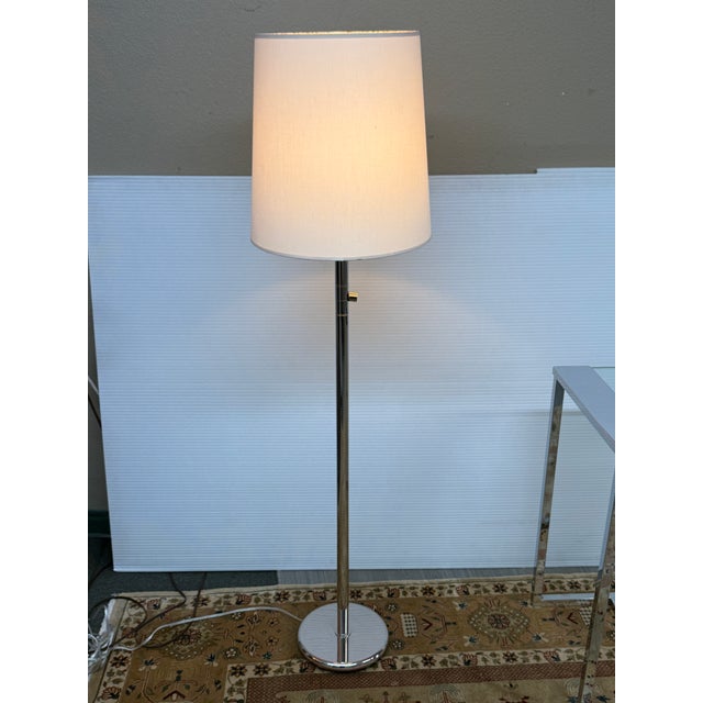 Design Plus Gallery presents a Traditional Chrome Floor Lamp with Drum Shade. The floor lamp stands tall at just over five...