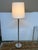 Design Plus Gallery presents a Traditional Chrome Floor Lamp with Drum Shade. The floor lamp stands tall at just over five...