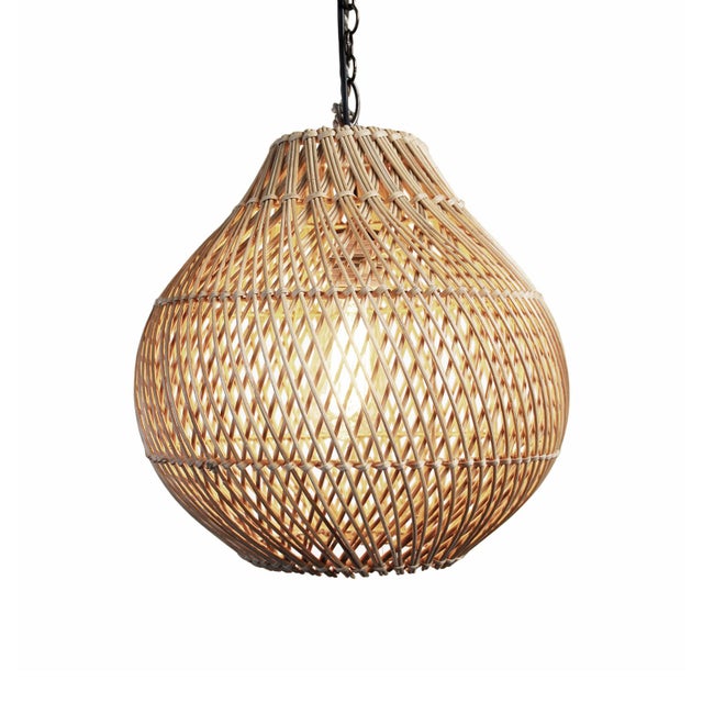 Natural hand woven wicker Bawang style hanging lantern. Beautiful warm glow when illuminated. Each may vary in natural...