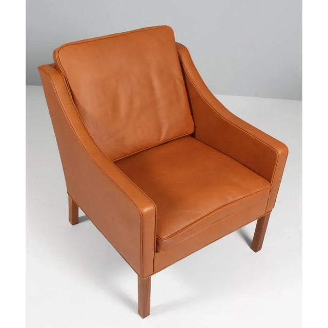 Børge Mogensen lounge chair new upholstered with walnut elegance aniline leather. Legs of teak. Model 2207, made by...