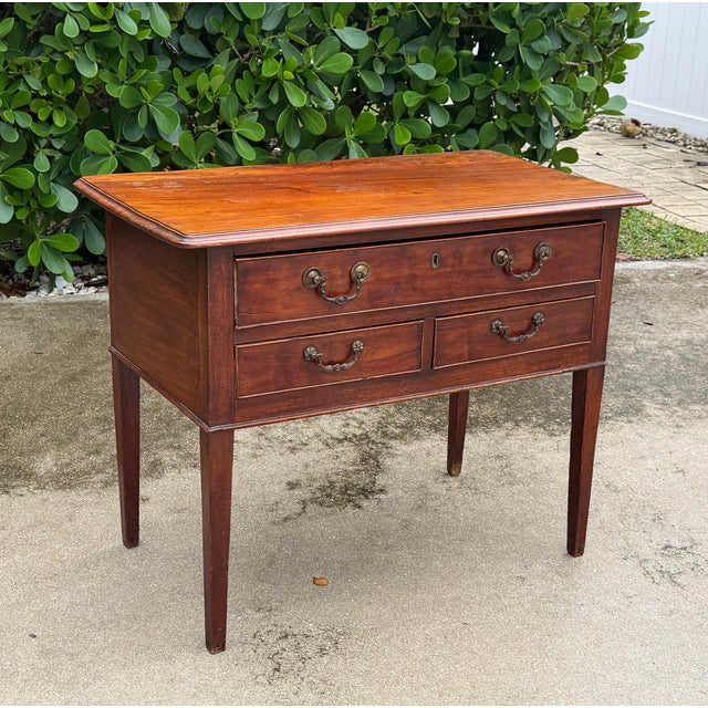 This antique mahogany sideboard has the kind of character that makes an older piece work beautifully in a contemporary...