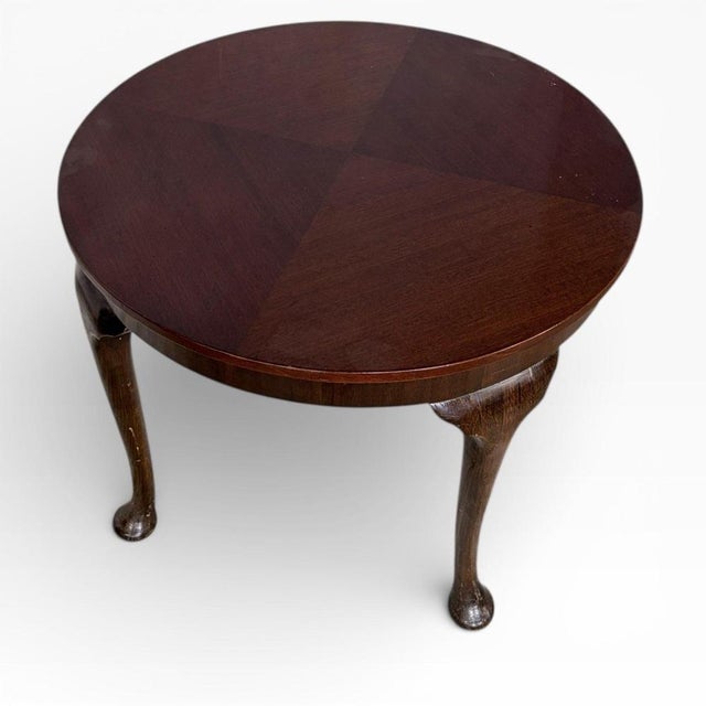 This mahogany tea table combines classic English design with practical use, delivering a timeless piece that enhances any...