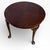 This mahogany tea table combines classic English design with practical use, delivering a timeless piece that enhances any...