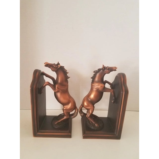 Vintage bronzed equine bookends with walnut base. These bookends are stunning and the horses are very detailed. The bottom...
