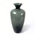 Bring timeless sophistication to your home with this striking vintage mid-century modern art glass vase. Crafted with an...