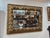 An exceptional 18th-century French mirror featuring a substantial carved and gilded wooden frame of remarkable decorative...