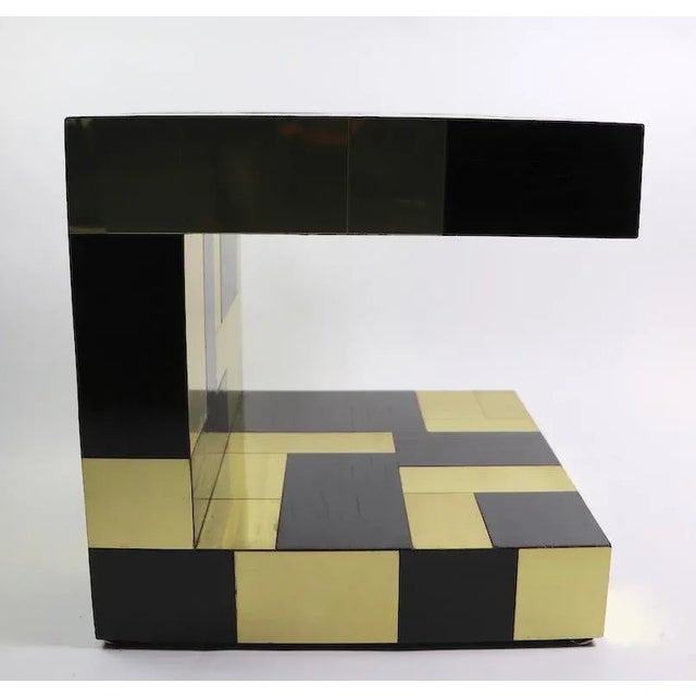 Rare and unusual Cityscape side table signed Paul Evans with brass and wood panels. This stunning combination is not often...