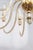 This is a beautifully executed Venetian glass chandelier with gently curved arms and refined brass detailing. The piece...