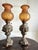 Set of two bronze and amber glass oil lamps, 1930 Intact and in good condition. Found in a noble apartment in my hometown,...