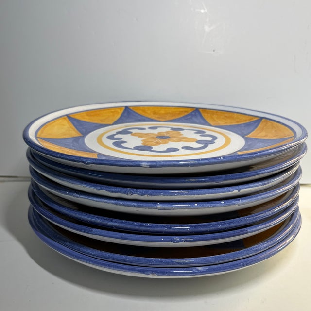Charming set of 8 earthenware dinner plates made by MM Portugal (or Zrike) in the 1980s - 1990s. Bold design or sun or...