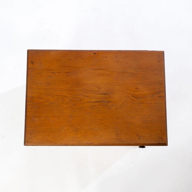 Antique oak spool cabinet with detailed knobs and dovetailed drawers. Used to have legs on it but we removed them to bring...
