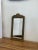 The Petina on the frame shows that it may have originally been gilted wood. Ornate detailing on the wooden frame with...