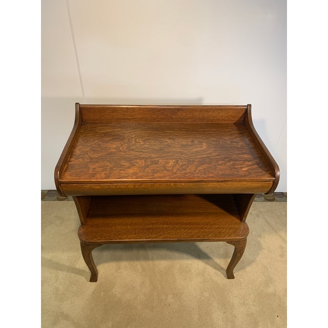 Wonderful quarter sawn oak server or console with a single drawer and a large lower shelf area. This turn of the century...