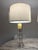 Sophisticated and elegant, this matching pair of Lauren Ralph Lauren crystal table lamps features faceted clear crystal...