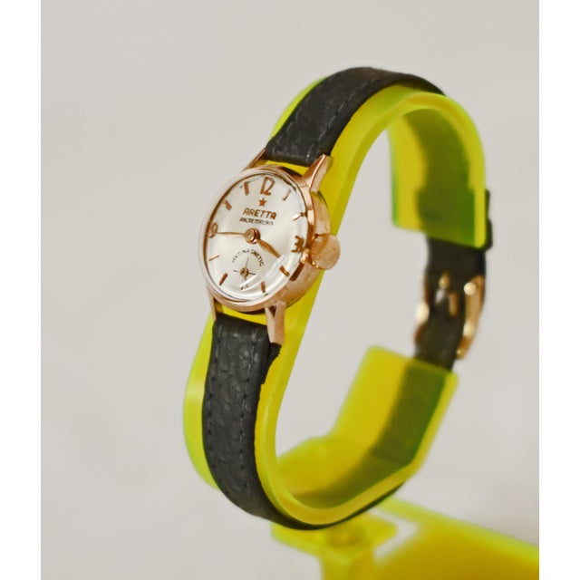 Aretta Ladies' Gold Wristwatch Swiss ladies' wristwatch, made in 1960/70. 18K rose gold (750), hand-wound, lever...