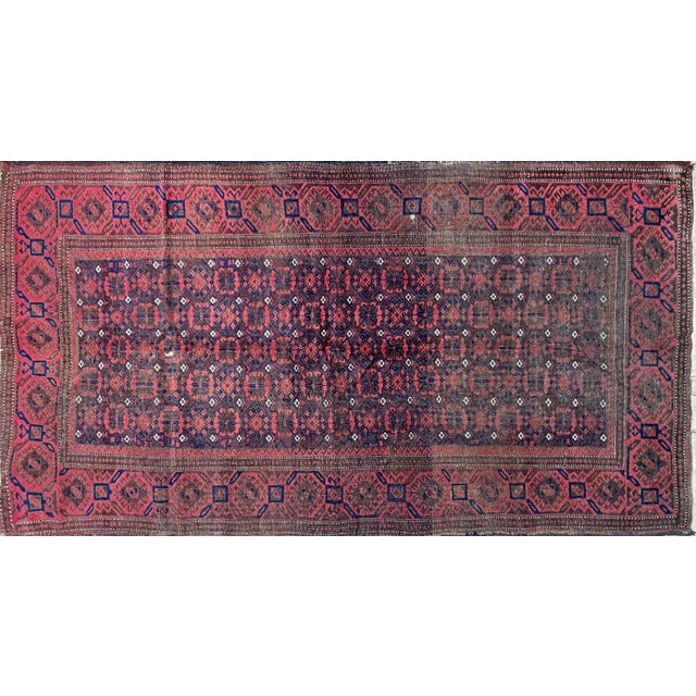 Experience the Timeless Elegance of a Belouch Turkoman Rug Step into a world of craftsmanship and tradition with a...