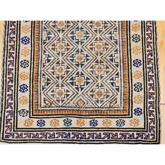 Early 20th Century Baluch Tribal Area Rug in a Prayer Pattern in Ivory, Brown, Navy Blue For Sale - Image 4 of 11