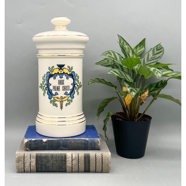 Striking vintage ceramic apothecary jar fashioned by Blair and made in the U.S.A. This classic pharmacy jar features the...