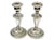 Early 20th century English silverplate candlesticks offered as a pair. The elegant tapered stems rise from broad decorated...