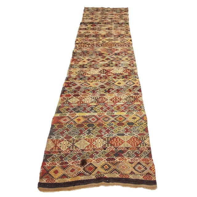Handwoven vintage kilim rug from Denizli region of Turkey. Approximately 50-60 years old. In very good condition.
