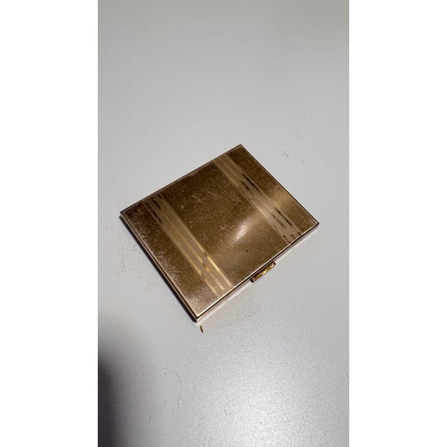 Available is a vintage Art Deco Elgin American compact, with original powderpuff and powder screeen. These highly sought-...