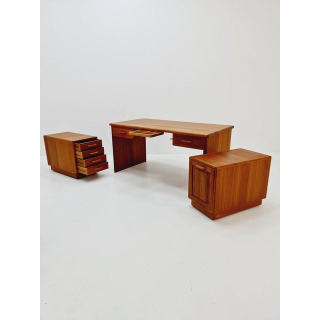 Mid century Danish solid teak modular desk By Dyrlund, 1960s Design year: 1960s Dimensions: 73 D x 150 W x 73H cm It is in...